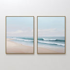 The Gentle Surf Set of 2 features framed beach scenes with gentle waves and soft sand, creating perfect coastal wall art that brings peaceful, seaside charm to any living room decor.