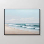 Gentle Surf Canvas Art: a framed painting of gentle waves on a sandy shore beneath a soft blue sky, ideal coastal wall art to enhance your bedroom decor.