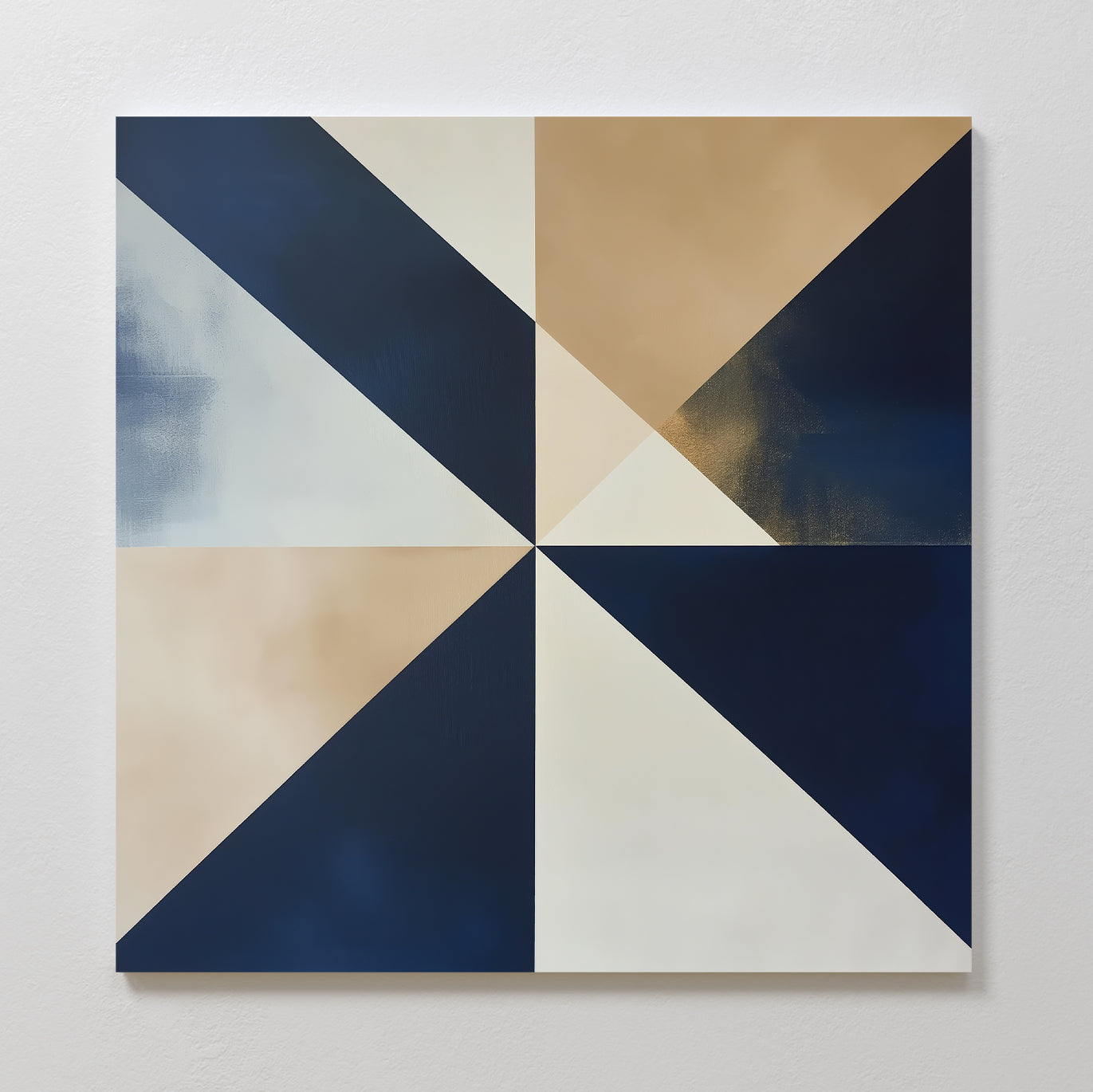 Geometric Night Canvas Art displays intersecting triangles in navy blue, beige, and off-white, creating a symmetrical pinwheel on a square canvas—a striking piece of modern wall art perfect for light gray walls.