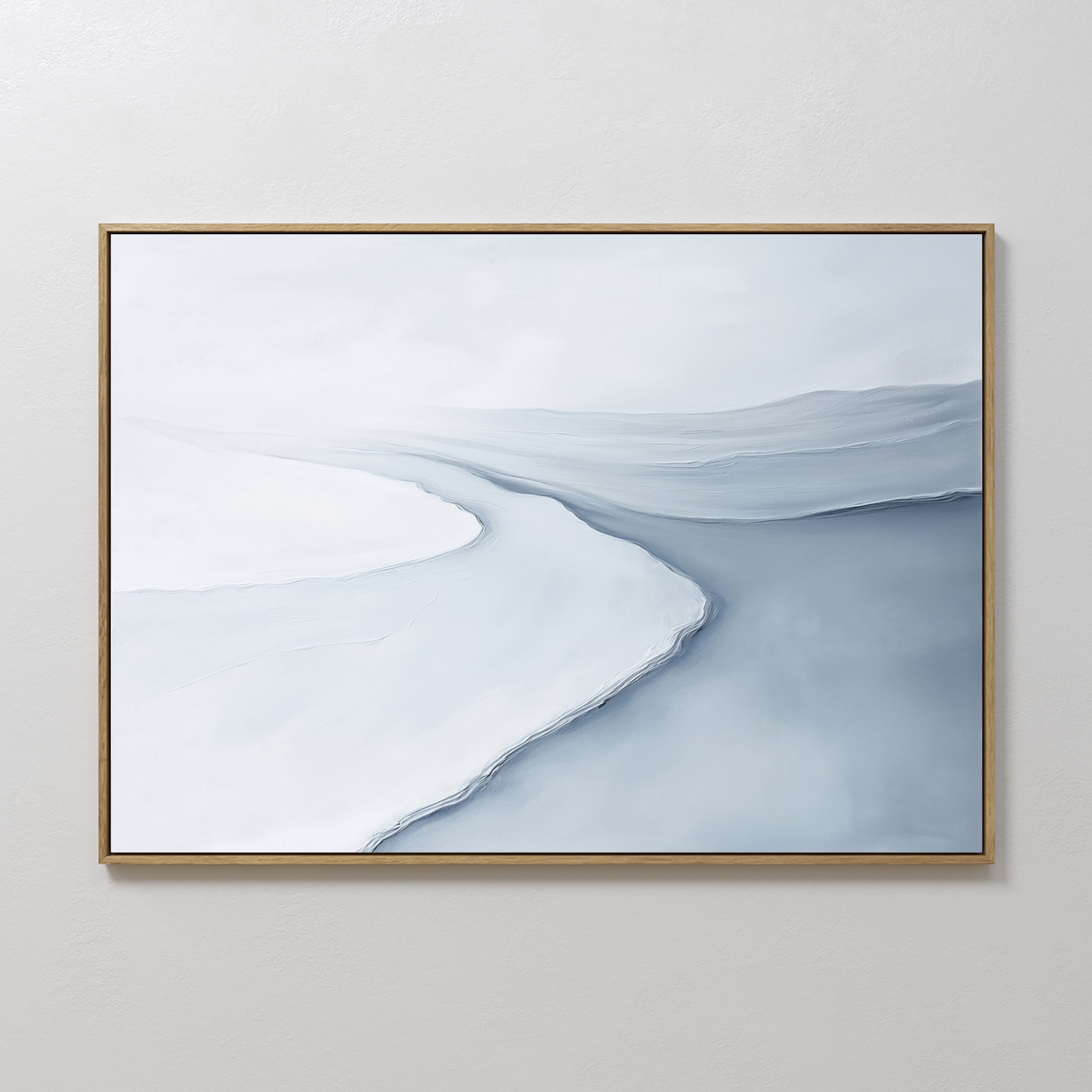The Glacial Flow Canvas Art – Horizontal features abstract sweeps in white, light gray, and blue, evoking a tranquil river under clouds—perfect minimalist decor for a modern living room with a plain light-colored wall.