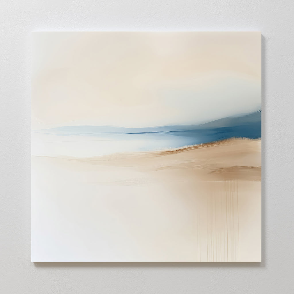 Golden Drift Canvas Art features soft beige, tan, and blue tones blended in a minimalist abstract style, evoking a serene landscape. Perfect for adding calm to bedroom or living room decor.