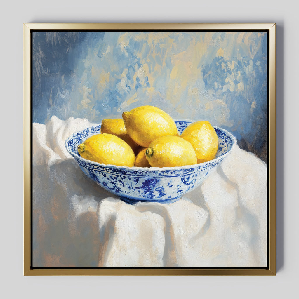 The Golden Fruit Canvas Art features a blue and white bowl filled with vibrant yellow lemons on a white cloth, set against a textured blue background—an ideal vintage touch for your home decor.