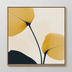 Golden Leaves Canvas Art features two abstract yellow leaves with dark stems on a light background, framed in wood—an ideal choice for stylish living room decor and large wall art.