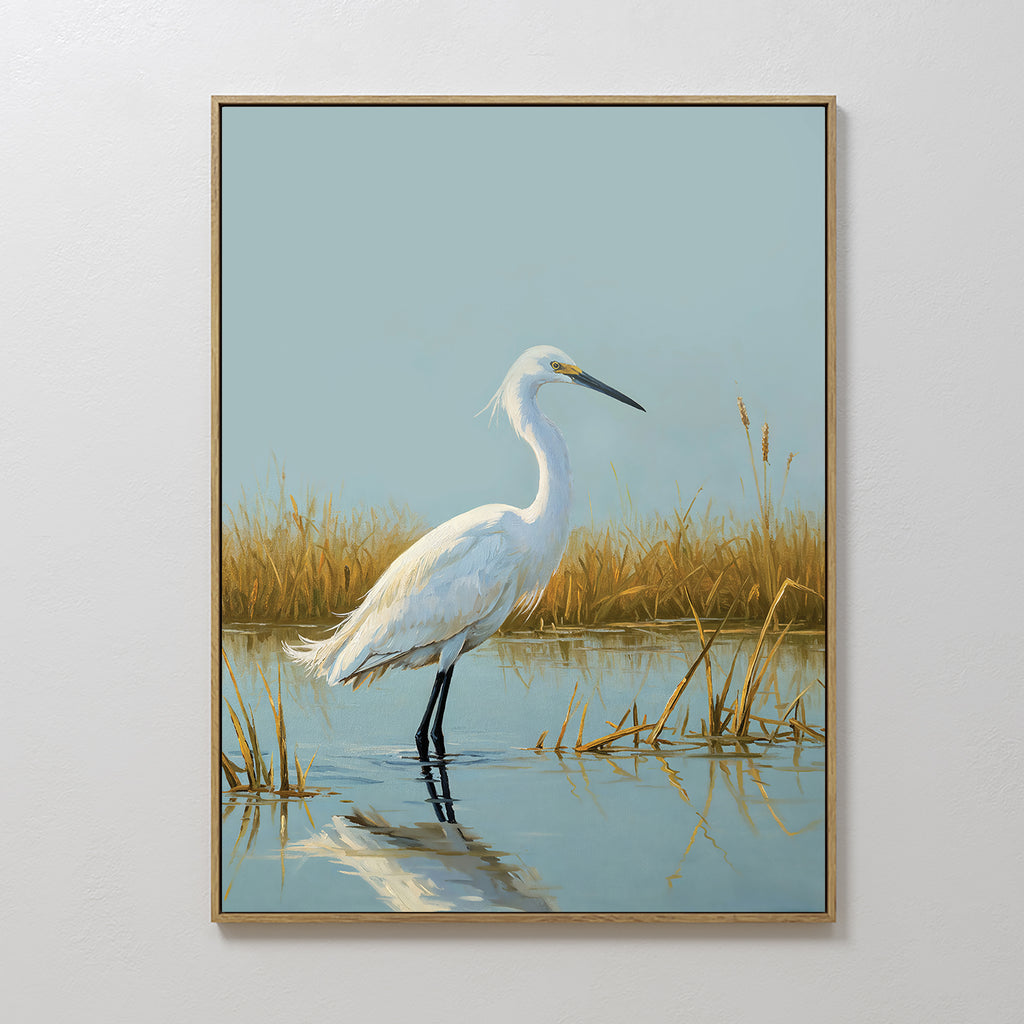 Golden Marsh Egret Canvas Art depicts a white egret in shallow water amid golden reeds with its reflection below and a clear blue sky, creating elegant wall art ideal for serene home decor and tranquil Nordic Park vibes.