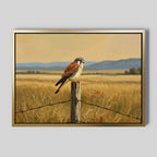 Golden Plains Canvas Art showcases a small kestrel perched on a fence post amid golden grass, with blue hills and a warm sky—nature-inspired wall decor ideal for enhancing any room’s ambiance.