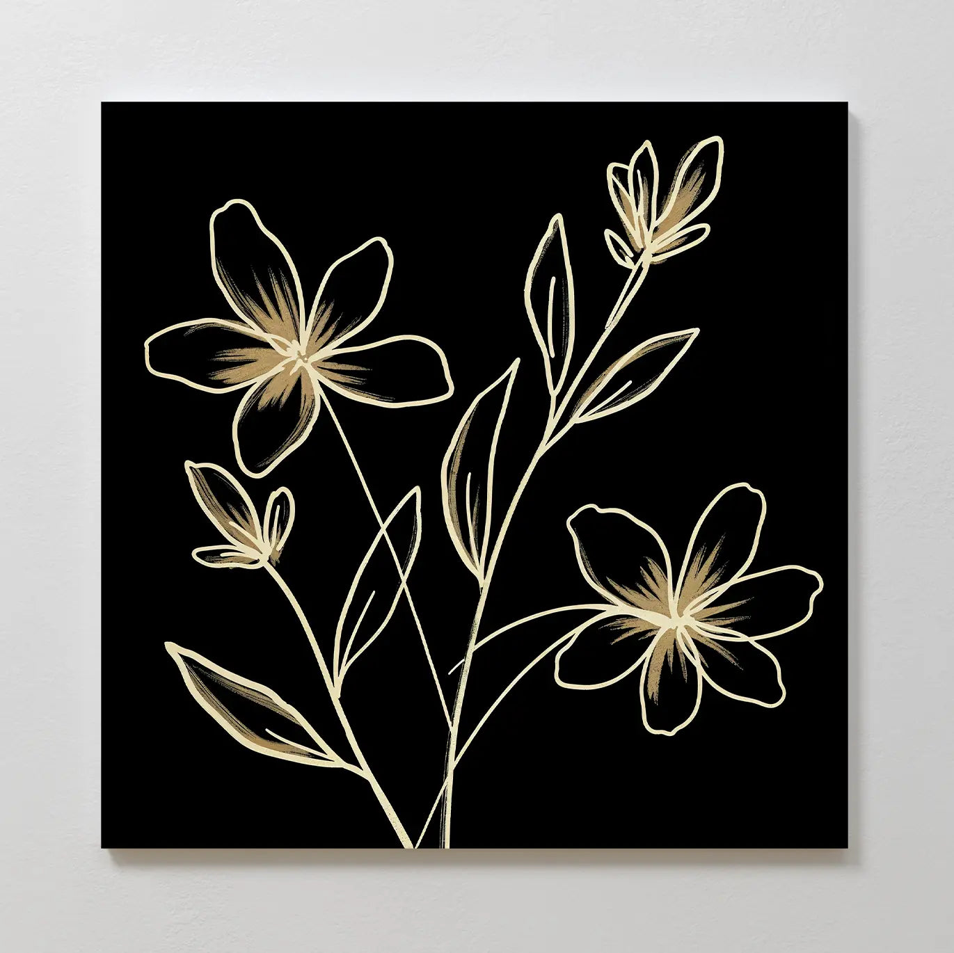 Golden Stems Canvas Art features a minimalist line drawing of three flowers with leaves, outlined in gold on a solid black square background. This elegant wall decor brings refined floral style and sophistication to any room.