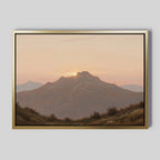 Golden Summit Canvas Art features a mountain at sunset with a pastel sky and rolling hills on a light gray background—an elegant choice to enhance your living room or bedroom decor.