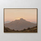 The Golden Summit Canvas Art features a framed mountain landscape at sunset with soft pastel skies and rolling hills, making it stunning wall art—perfect for adding a serene touch to your living room or bedroom decor.