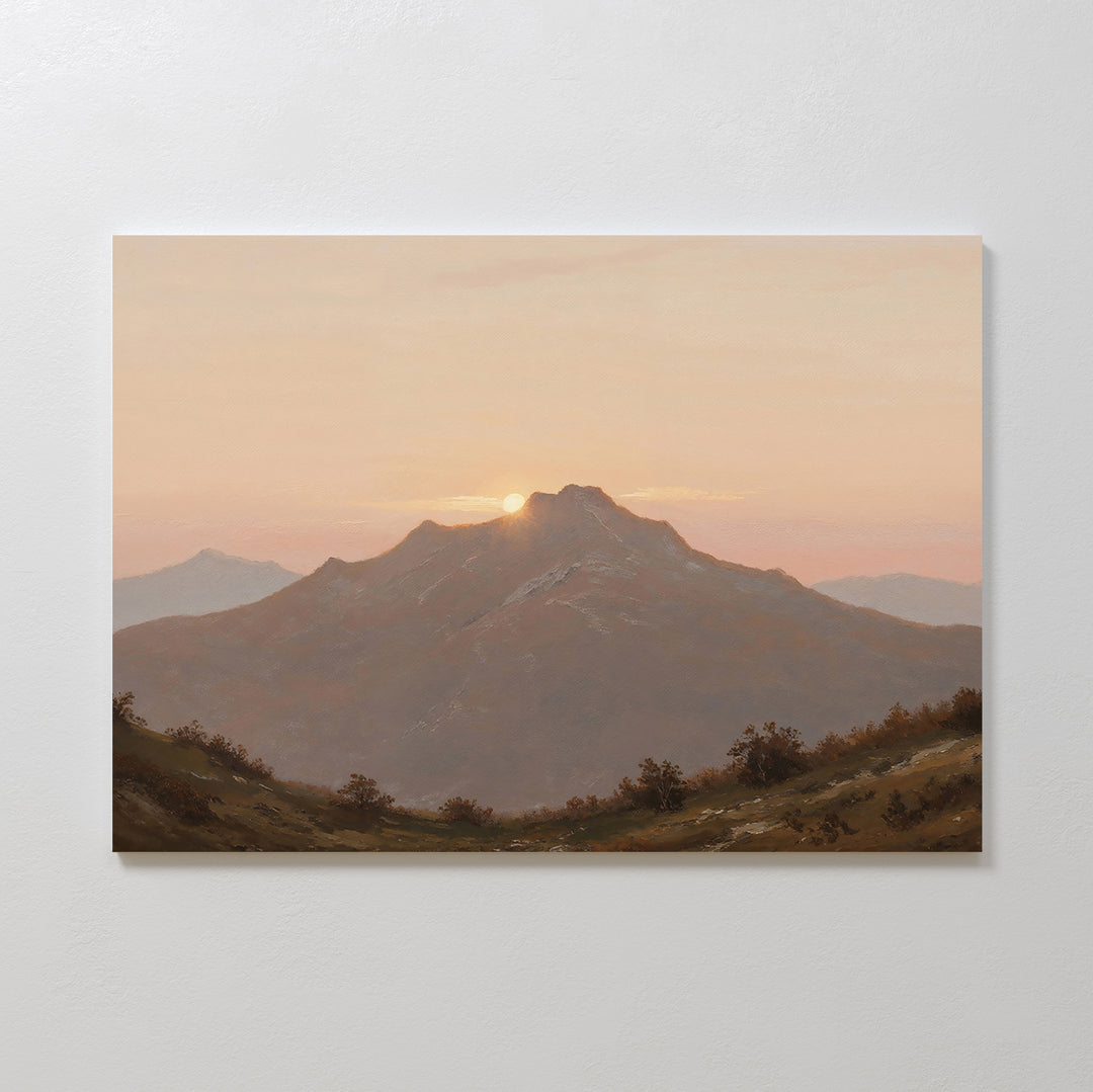 Golden Summit Canvas Art showcases the sun setting behind mountains in soft pastel tones. This landscape wall art with rolling hills is ideal as tranquil living room or calming bedroom decor.