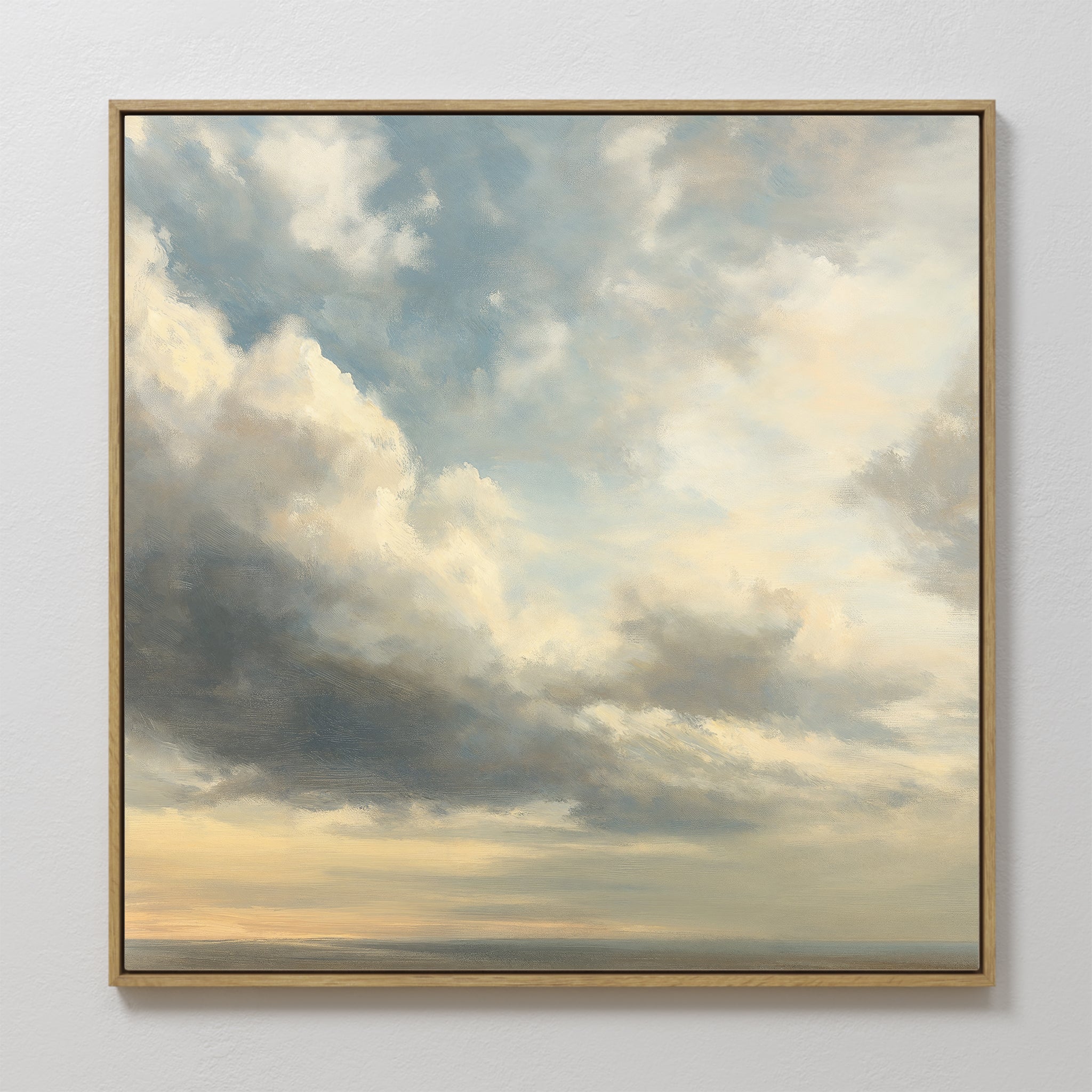 Heavenly Drift Canvas Art features soft, billowy blue, white, and gray clouds illuminated by gentle sunlight on a plain white wall—ideal for adding serenity to your living room or enhancing vintage decor.