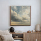 A serene living room with a beige sofa, vintage decor on a wooden sideboard, and the Heavenly Drift Canvas Art elegantly framed above.