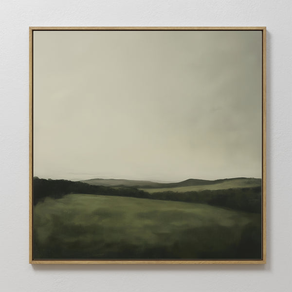 Add tranquil style to your living room with the Hills at Dusk Canvas Art—a framed minimalist print featuring misty rolling green hills beneath a soft, overcast sky for a serene, calming decor accent.