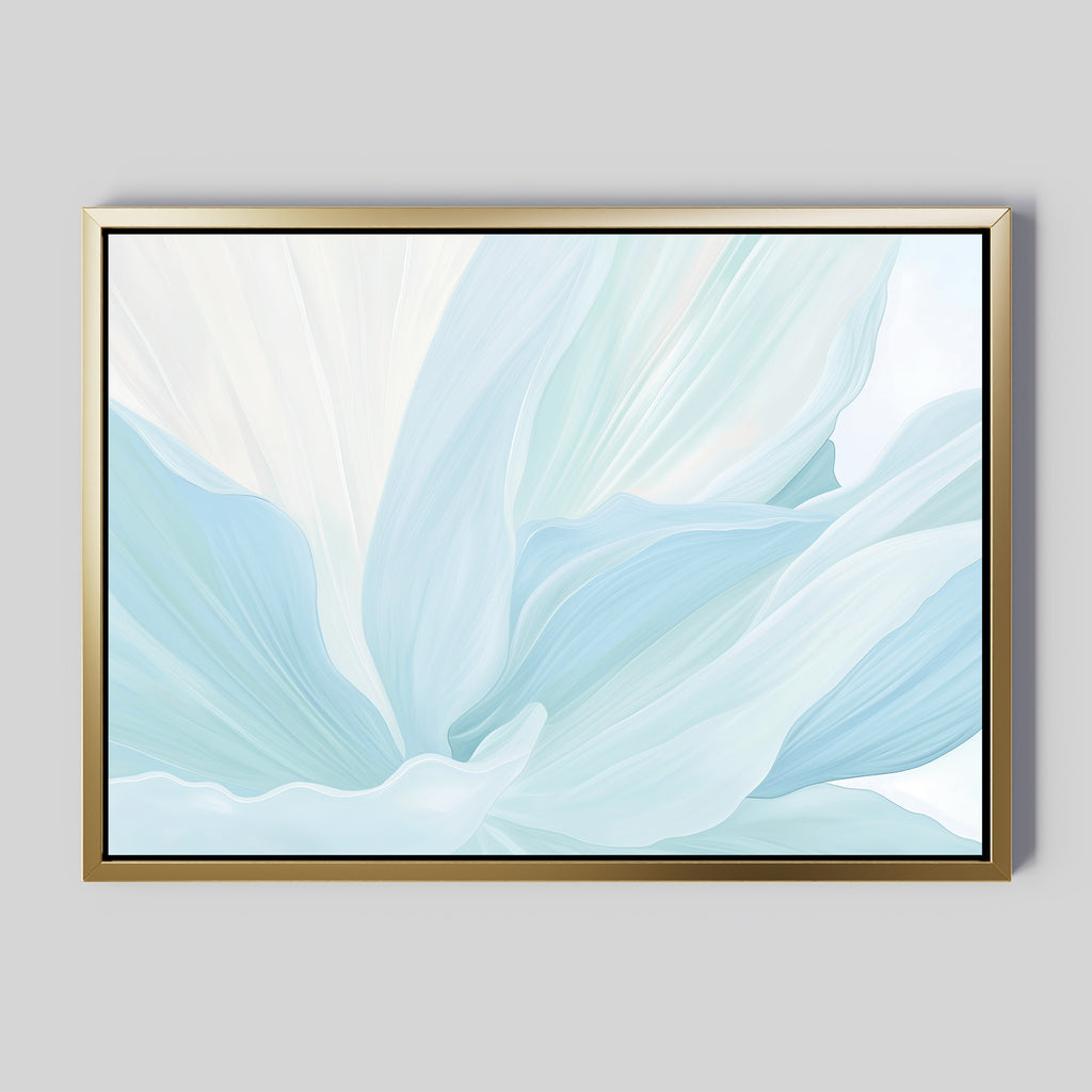 The Icy Petals Abstract Canvas Art features soft, flowing shapes in light blue and white, reminiscent of delicate petals on a gray background. Its simple gold frame adds modern, minimalist style, making it perfect wall art for living room decor.