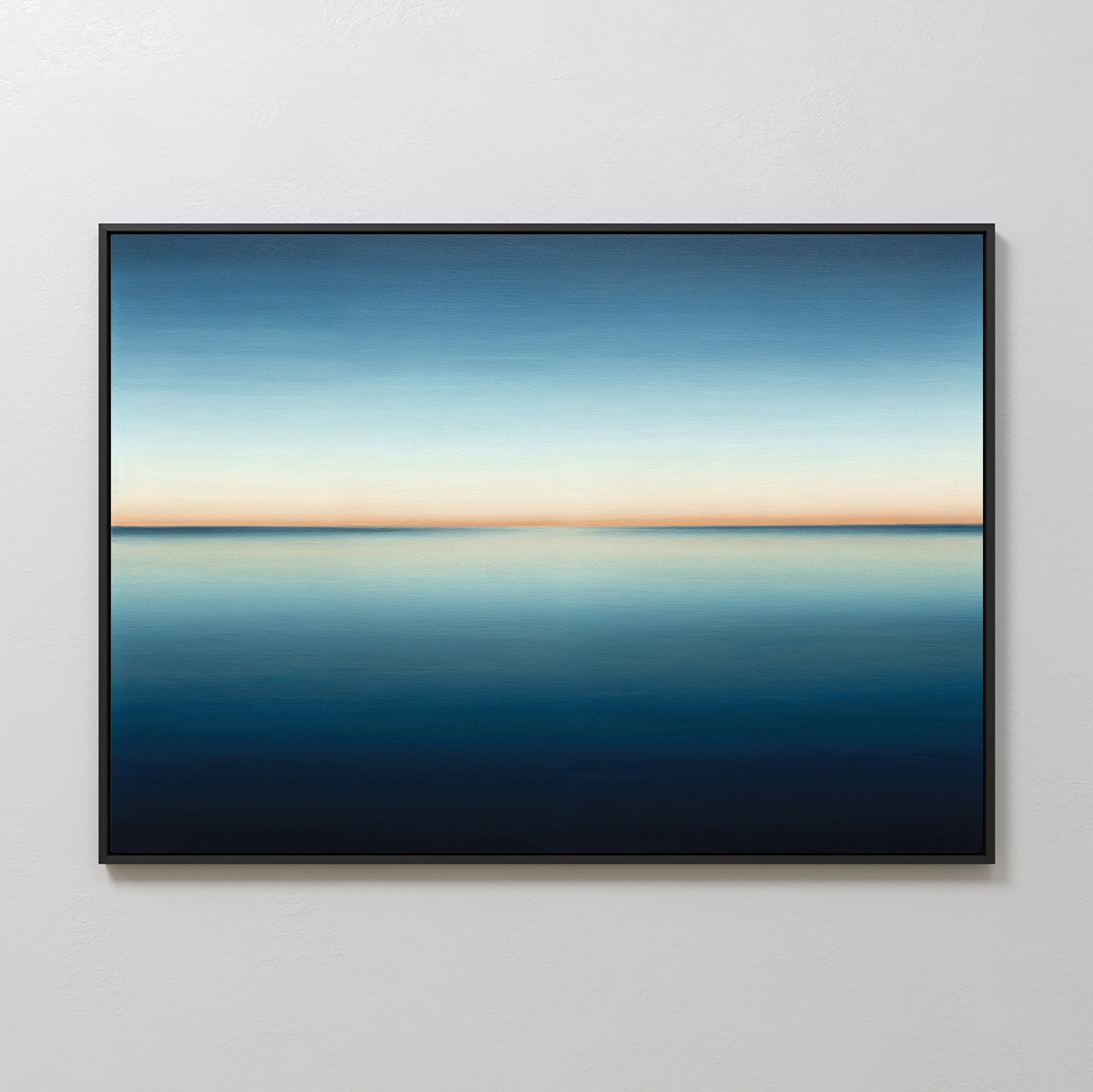 The Indigo Passage Canvas Art – Horizontal features a tranquil, minimalist horizon over calm water with a gradient sky, ideal for modern living room decor and adding serene elegance to your space.