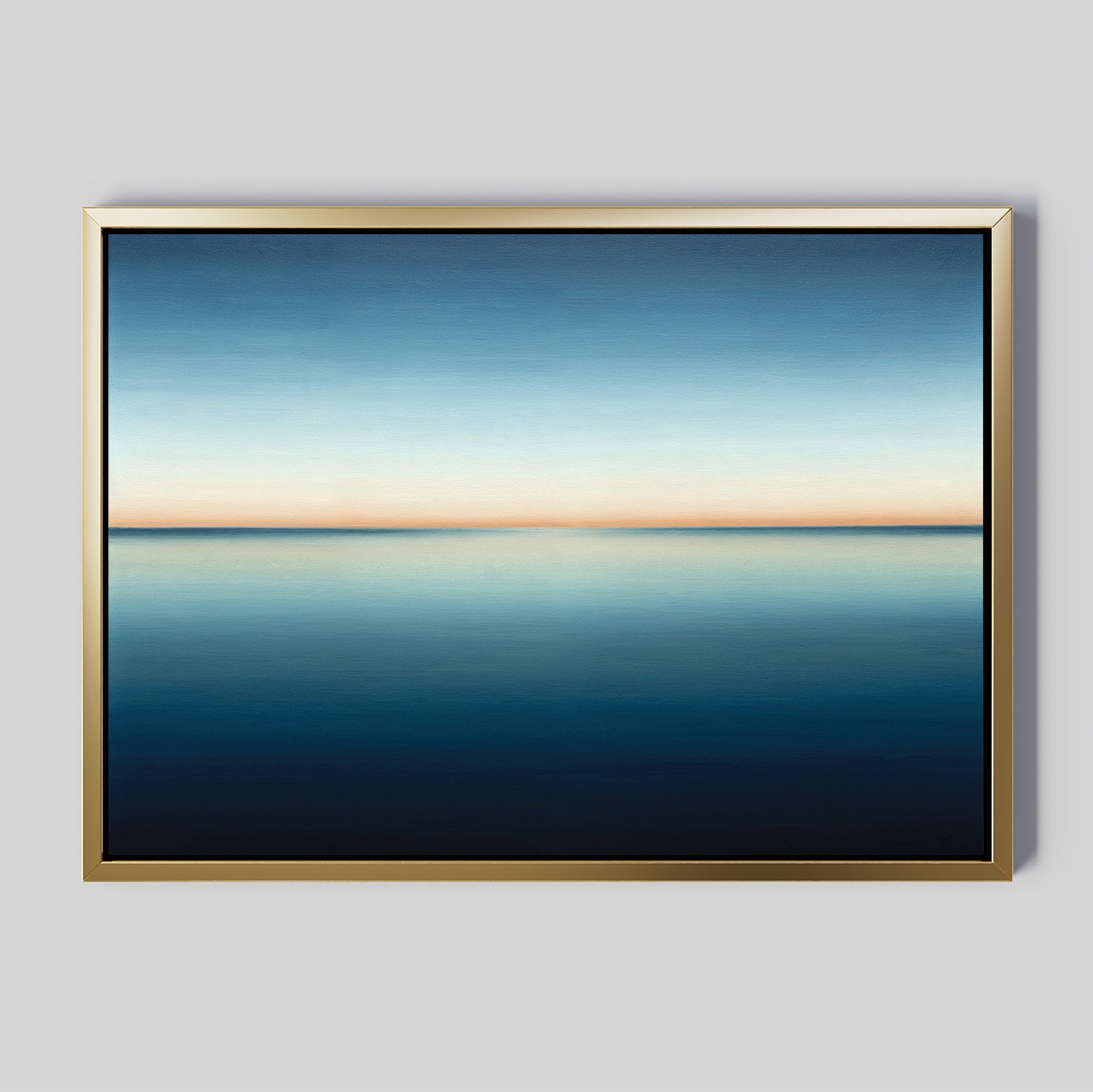 Indigo Passage Canvas Art – Horizontal features a serene seascape with a calm indigo-blue ocean and a soft orange horizon, creating minimalist wall art ideal for modern living room decor.