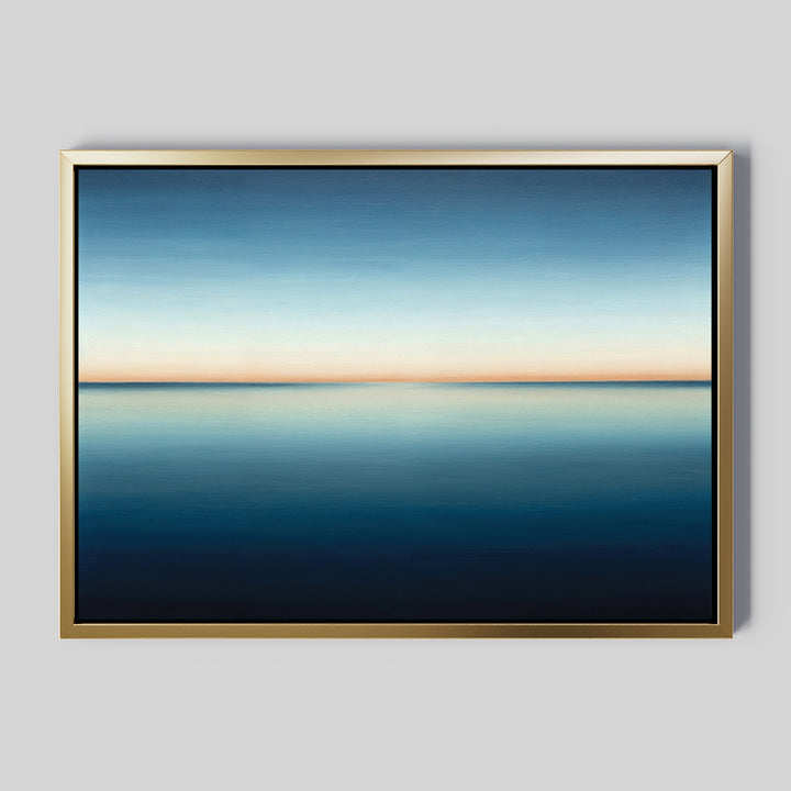 Indigo Passage Canvas Art – Horizontal features a serene seascape with a calm indigo-blue ocean and a soft orange horizon, creating minimalist wall art ideal for modern living room decor.