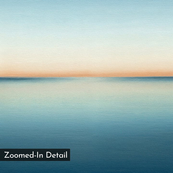 The Indigo Passage Canvas Art – Horizontal features a serene, minimalist painting of a calm sea and sky in soft blue and peach gradients. Ideal as large wall art for modern living rooms. "Zoomed-In Detail" appears in a black box at the lower left corner.