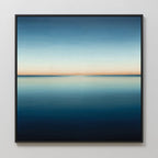 Indigo Passage Canvas Art is a framed painting with a calm, minimal seascape and clear horizon, featuring indigo hues that blend from light blue to peach—perfect minimalist wall art for modern living room decor.