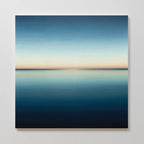Indigo Passage Canvas Art features a minimalist scene of serene water merging with the sky, soft blue gradients, and warm light—ideal indigo wall art to enhance modern living room décor.