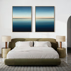 Modern bedroom with an olive green bed, white bedding, beige nightstands with matching lamps, and the Indigo Passage Set of 2 featuring abstract ocean-themed wall art above the headboard.