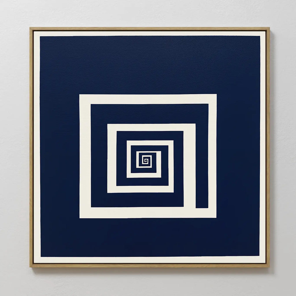 The Infinite Descent Canvas Art features white square spirals on a dark blue background, creating an optical illusion. Its light wood frame adds a modern touch, making it striking decor for light gray walls.