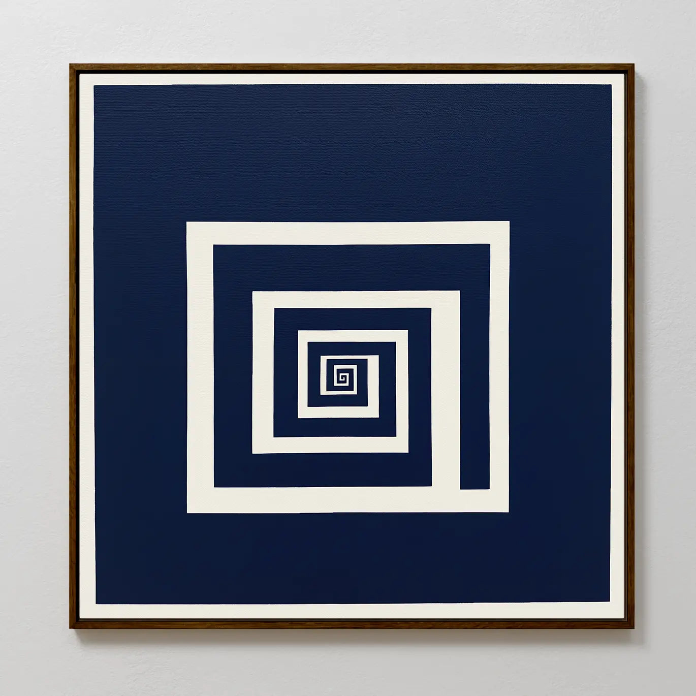 The Infinite Descent Canvas Art features white concentric squares in a spiral on a dark blue background, adding modern style to any light-colored wall.
