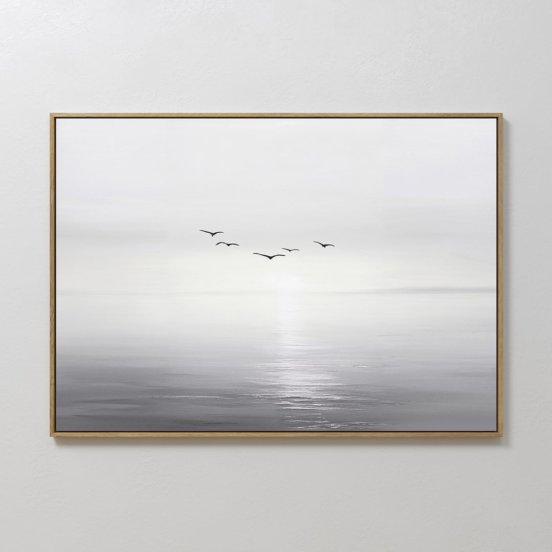 Into the Light Canvas Art – Horizontal: a minimalist framed painting of a serene gray and white seascape with sunlight on the water and five birds—ideal wall art for enhancing your living room decor.
