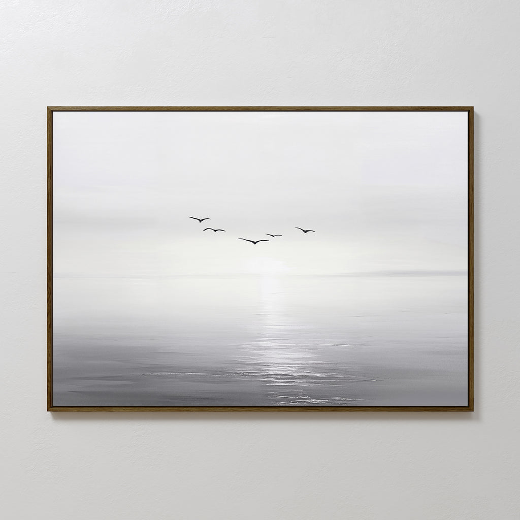 Into the Light Canvas Art – Horizontal features a calm, misty seascape in muted grays with six birds above the water, making it an ideal minimalist wall art piece for serene living room decor.