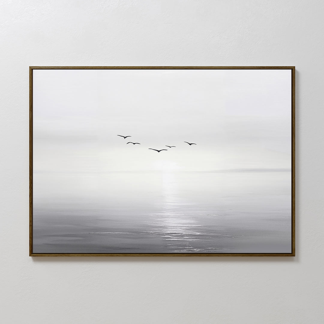 Into the Light Canvas Art – Horizontal features a calm, misty seascape in muted grays with six birds above the water, making it an ideal minimalist wall art piece for serene living room decor.