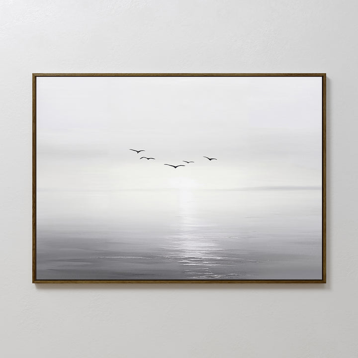 Into the Light Canvas Art – Horizontal features a calm, misty seascape in muted grays with six birds above the water, making it an ideal minimalist wall art piece for serene living room decor.