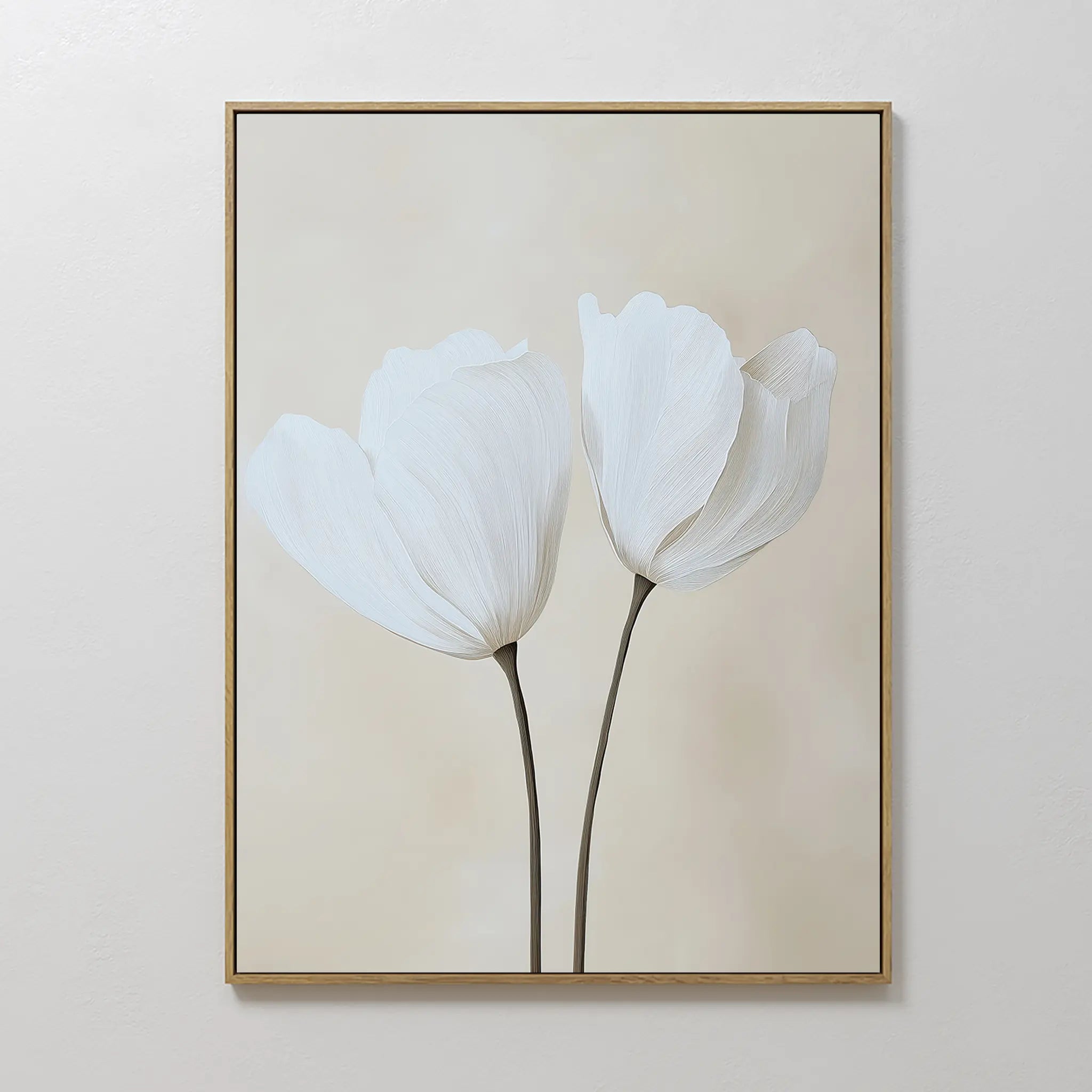 The Ivory Buds Canvas Art showcases two delicate white flowers with slender stems on a light beige background, framed in slim gold. Perfect for neutral-toned and minimalist interiors, this elegant wall art enhances any space with subtle sophistication.