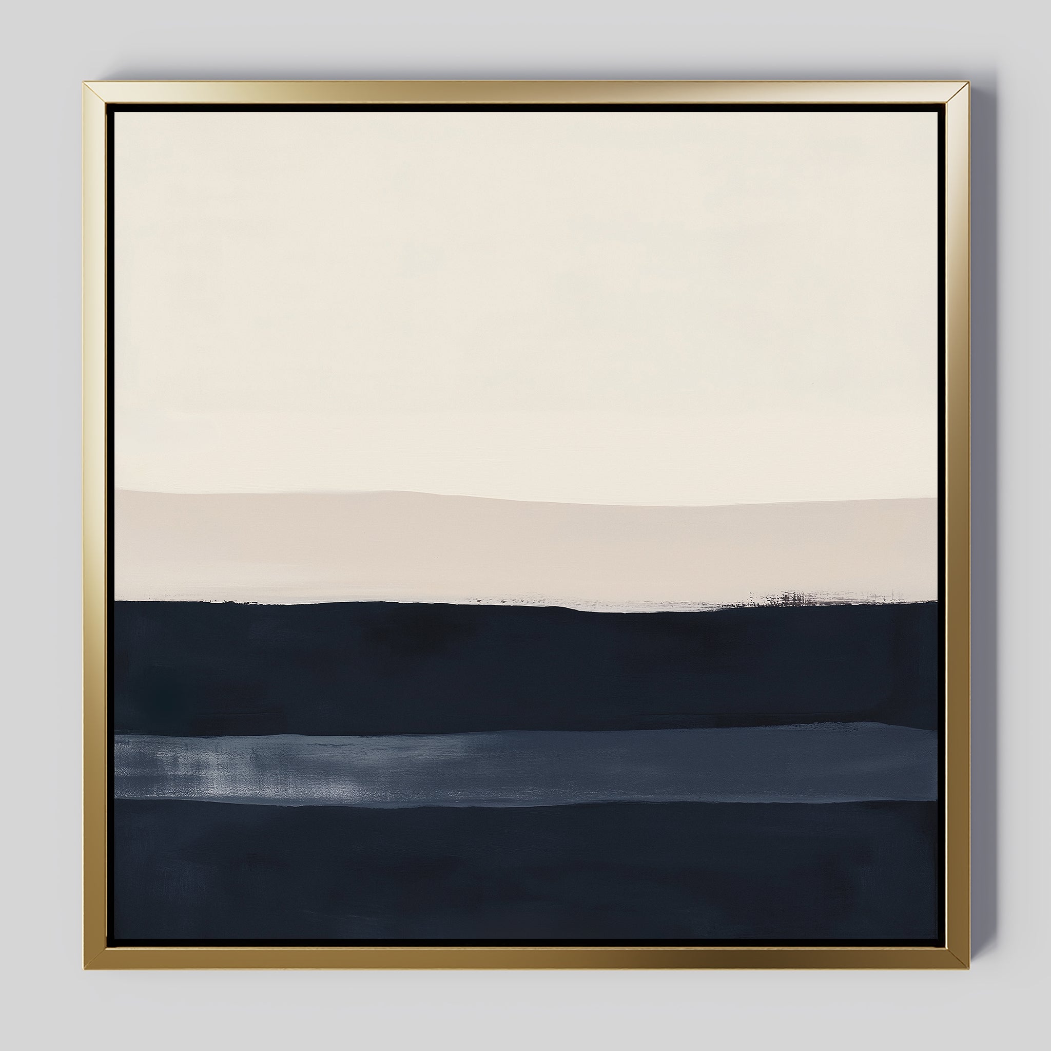 Ivory Dusk Canvas Art features abstract horizontal bands of white, beige, and dark blue in a gold frame. With softly blended edges, this minimalist wall art is ideal for modern interiors.