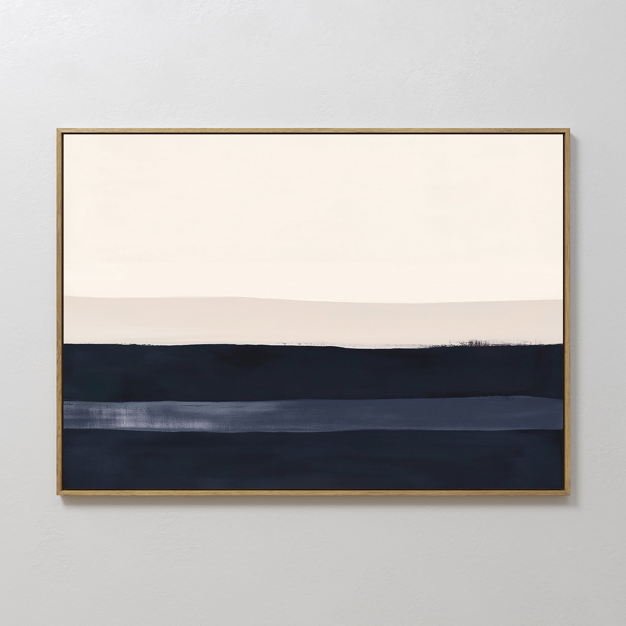 The Ivory Dusk Canvas Art – Horizontal features minimalist abstract bands in cream, light beige, and dark navy blue with a sleek gold frame—an elegant addition to modern interiors and perfect for accenting any light gray wall.