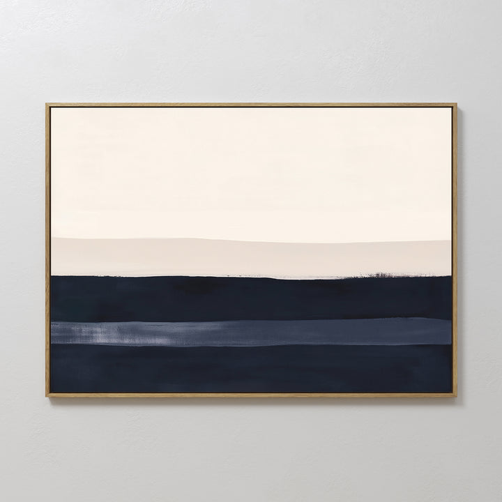 The Ivory Dusk Canvas Art – Horizontal features minimalist abstract bands in cream, light beige, and dark navy blue with a sleek gold frame—an elegant addition to modern interiors and perfect for accenting any light gray wall.