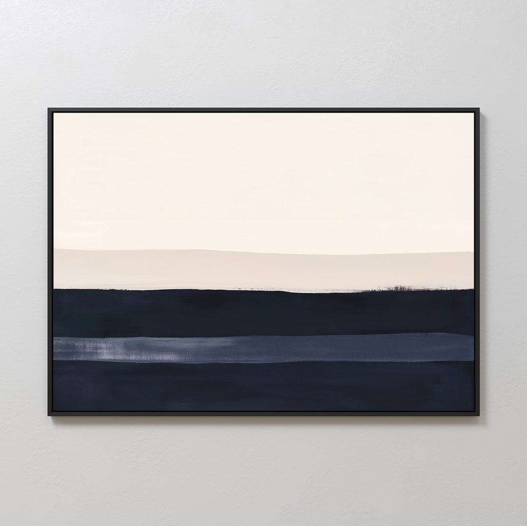 Ivory Dusk Canvas Art – Horizontal: Minimalist wall art with abstract cream, light beige, and dark blue bands in a black frame, displayed on a light gray wall—an elegant touch for modern interiors or living room decor.