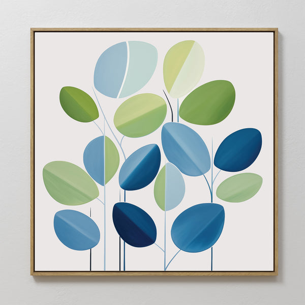 Layered Stillness Canvas Art features a framed abstract design of green and blue stylized leaves on thin stems against a white background, bringing a fresh, minimalist touch to modern living room decor.