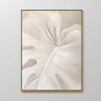 Leaf Whisper Abstract Canvas Art features a large, white monstera leaf with delicate details and soft shading on a neutral background—ideal minimalist wall art for any Nordic Park-inspired decor.