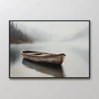 Lonely Boat Canvas Art features a serene framed painting of an empty wooden rowboat on calm, misty water with a foggy forest shoreline—peaceful lakeside wall art perfect for tranquil home decor.