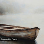 The Lonely Boat Canvas Art features a wooden rowboat on calm, misty water near the shore. With hazy, muted tones and a zoomed-in detail shown at the bottom left, it’s ideal for vintage wall art or tranquil bedroom decor.