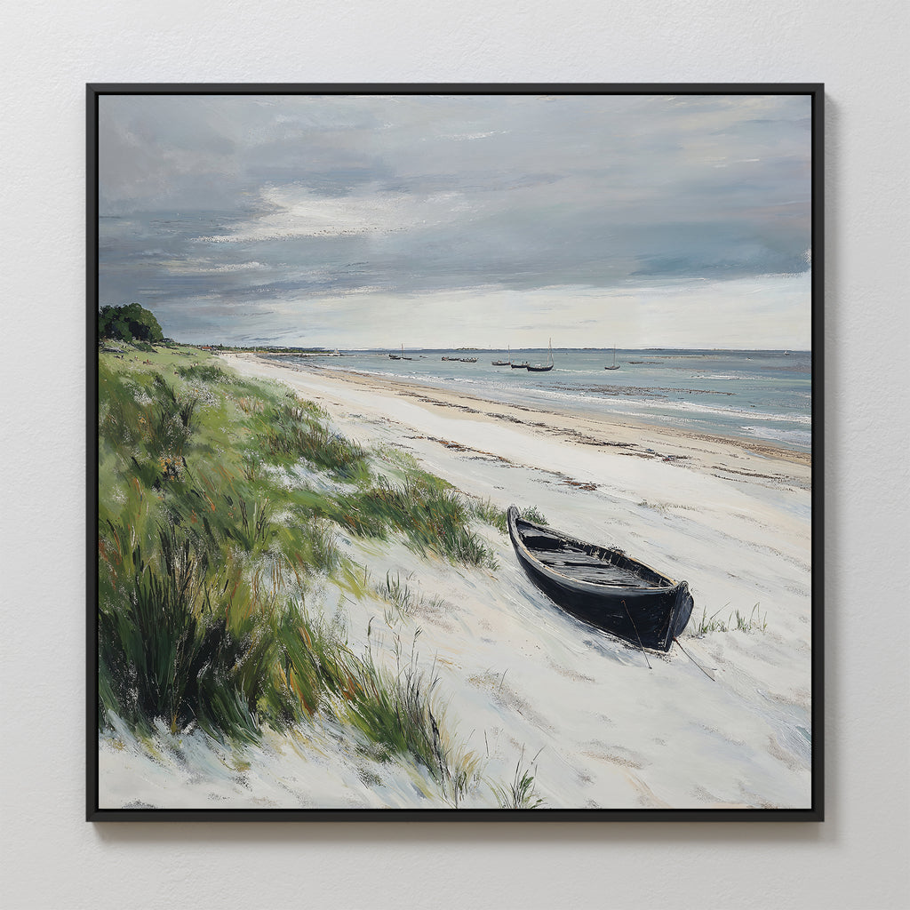 The Lonely Coast Canvas Art features a sandy beach with tall grass, a black rowboat on the shore, calm sea with distant boats, and a cloudy sky—ideal for bringing tranquil decor to any room.