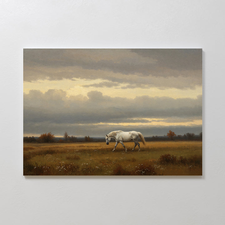 Low Light Walk Canvas Art captures a white horse strolling through a grassy field at sunset, framed by wildflowers and distant trees—ideal countryside wall decor for lovers of serene art prints.