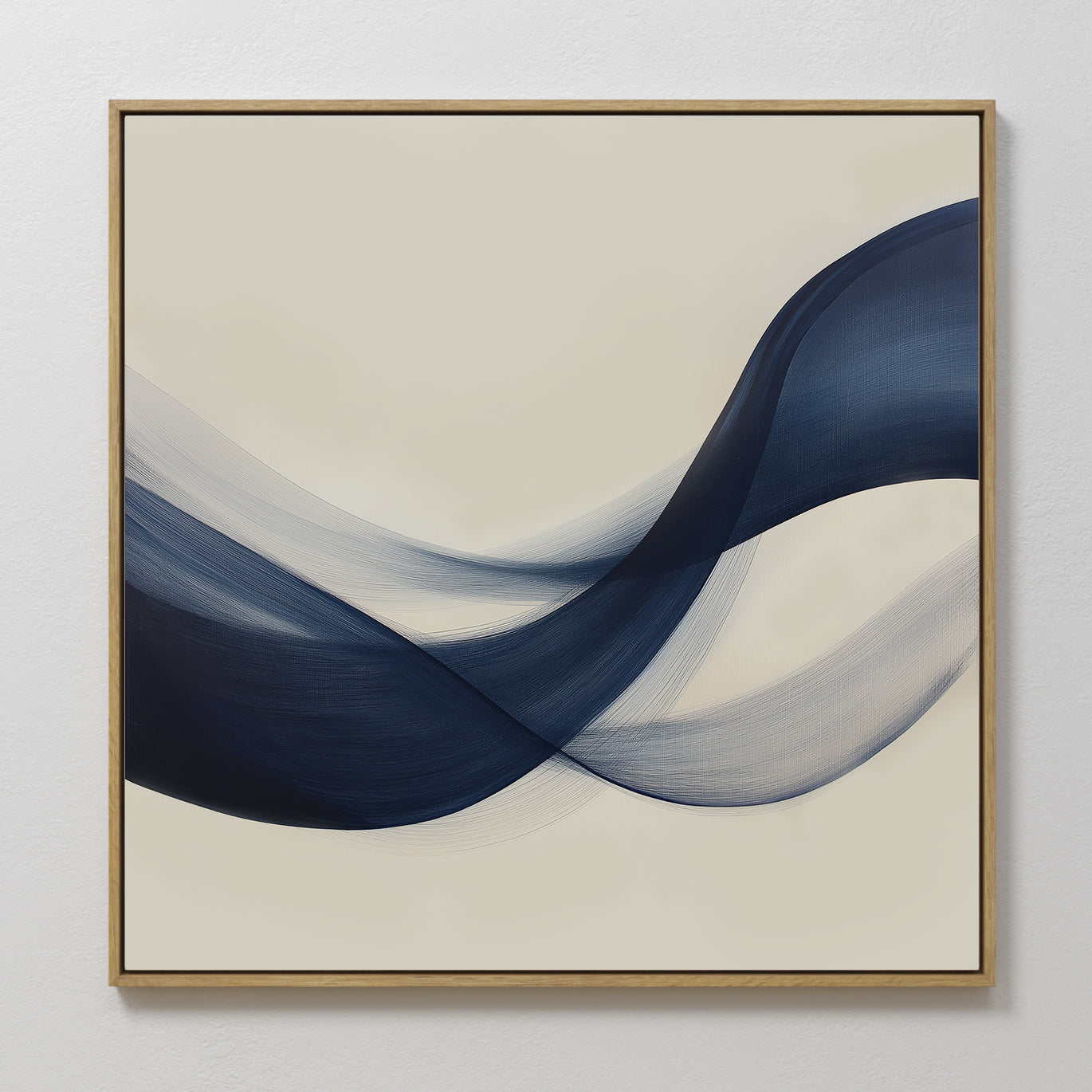 Tidal Flow Canvas Art features abstract, overlapping navy blue and gray brushstrokes on a light beige background, framed in thin wood. The flowing lines evoke waves, adding modern minimalist style to your wall decor.