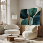 A modern living room features two white rounded chairs, a wooden coffee table, and a sideboard. Sunlight streams in over the Lush Teal Foliage Set of 2 wall art in green and blue, enhancing the decor with vibrant style.