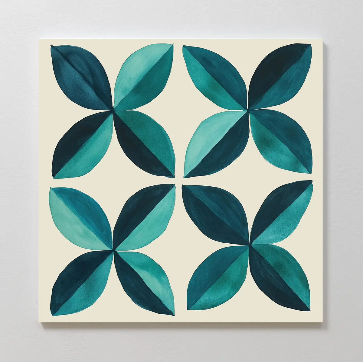 Marine Mosaic Canvas Art features four symmetrical floral shapes with teal and dark green petals on a light beige background, arranged in a grid. This modern wall art highlights a geometric, repetitive petal design.