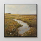 The Marshland Stream Canvas Art features a tranquil meadow with wildflowers, tall grasses, and a winding stream under a cloudy sky—an ideal wall decor piece to bring serene beauty to your living room.