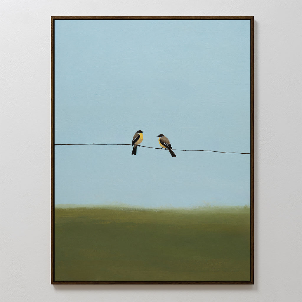 Meadow Line Canvas Art is a framed painting with two birds on a wire, set against a simple blue sky and greenish-brown ground—a perfect accent for minimalist interiors.