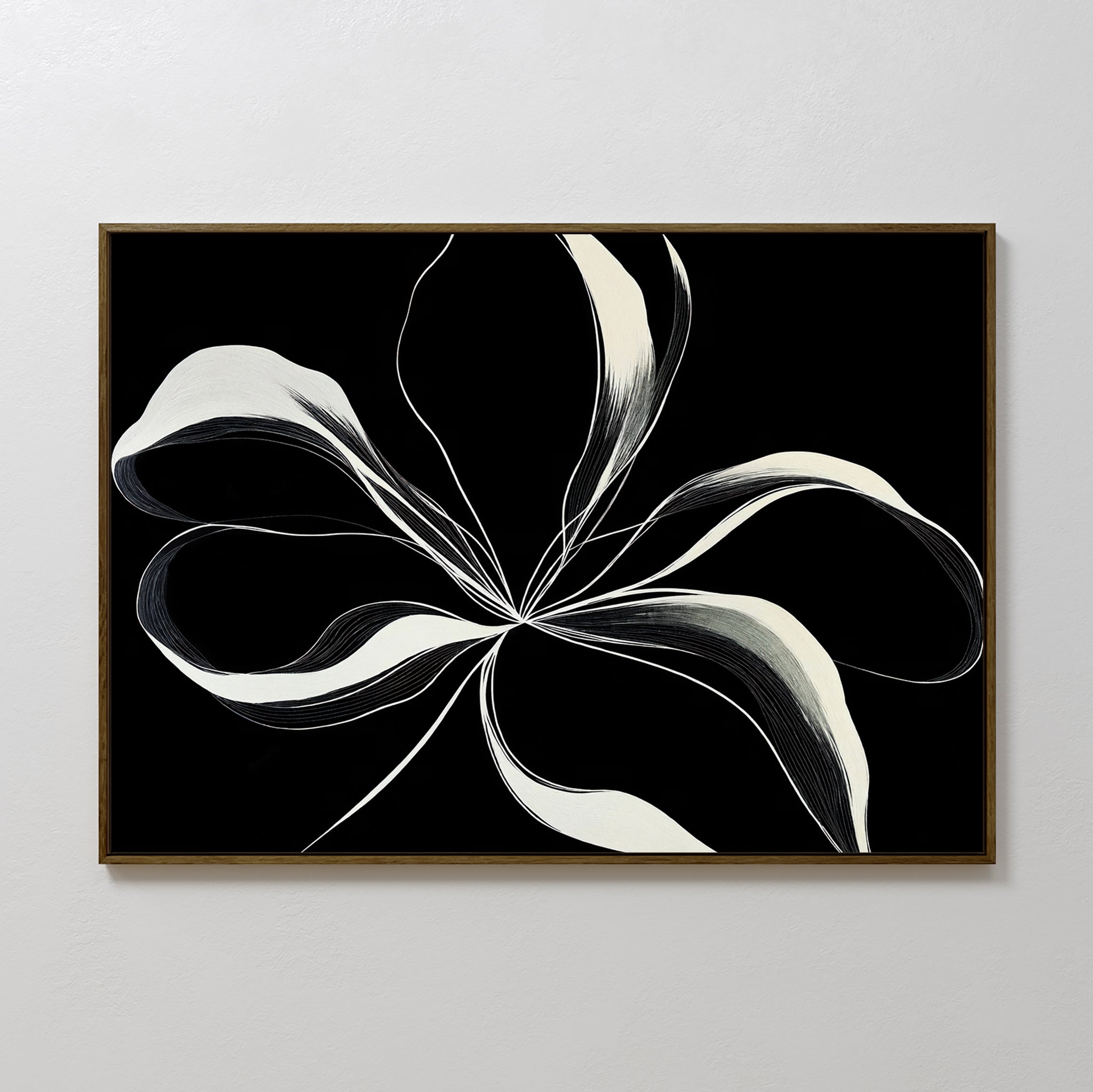 The Midline Motion Canvas Art features flowing white and cream lines on a solid black background, forming a floral-inspired shape—perfect minimalist wall decor for modern living rooms and shown here on a plain white wall.