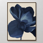 Minimalist wall art featuring a large dark blue flower with stylized petals on a light beige background, framed in black. The Midnight Bloom Abstract Canvas Art adds modern decor and abstract elegance to any space.