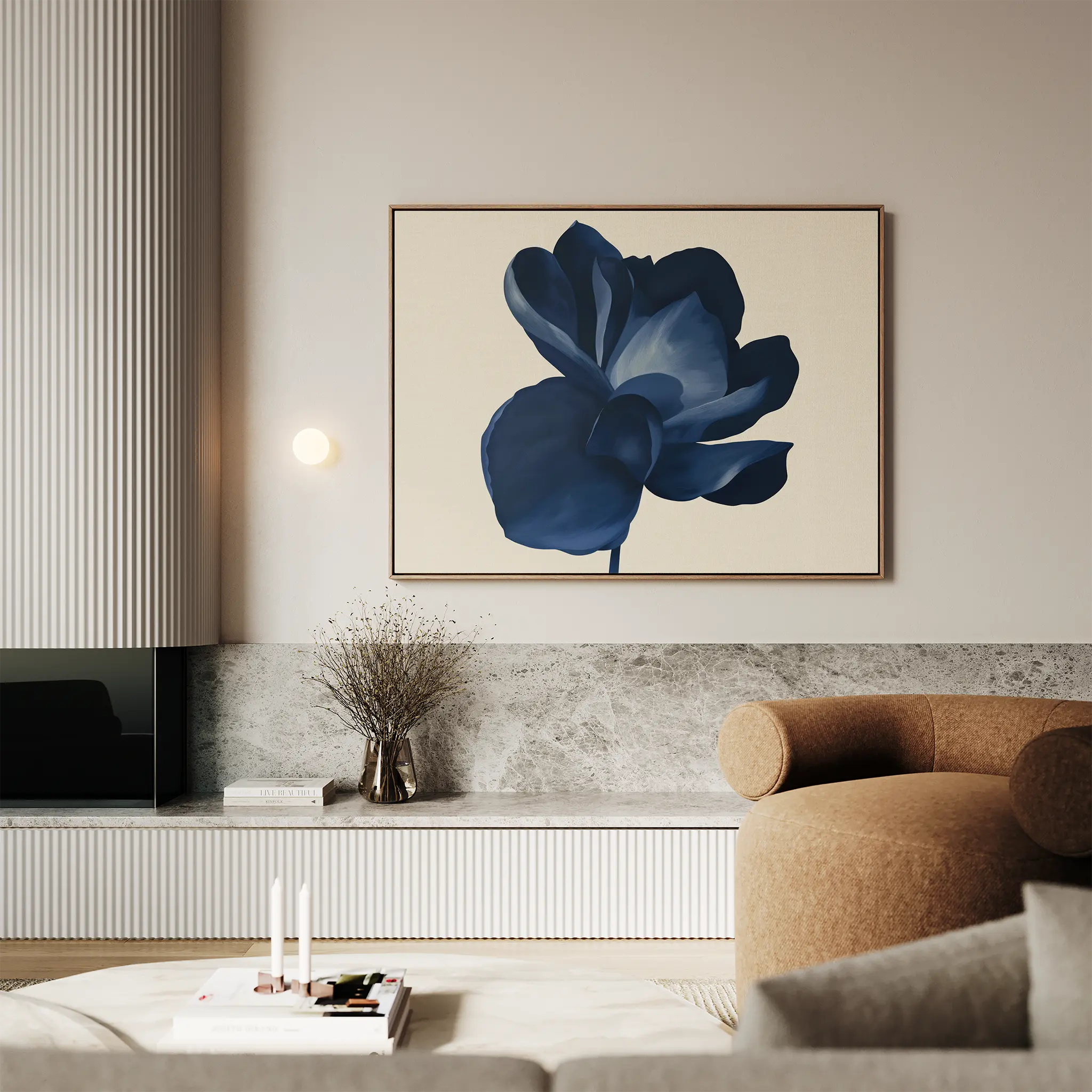 A modern living room with the Midnight Bloom Canvas Art – Horizontal, a beige curved sofa, a marble shelf holding a vase of dried branches, and minimalist decor for a touch of contemporary sophistication.