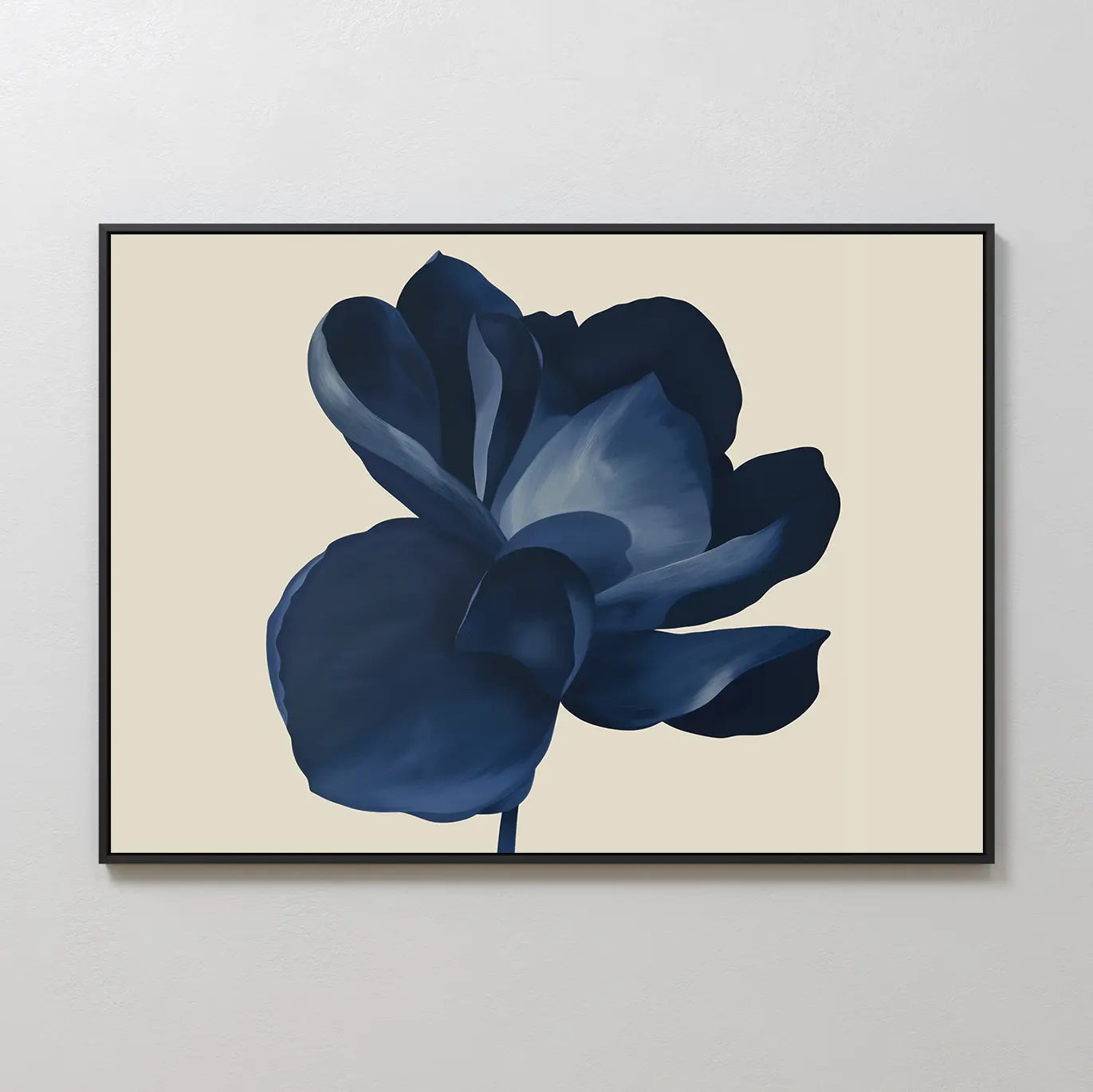 The Midnight Bloom Canvas Art – Horizontal features a single large dark blue flower on a light beige background, bringing minimalist decor and modern sophistication to any white wall.